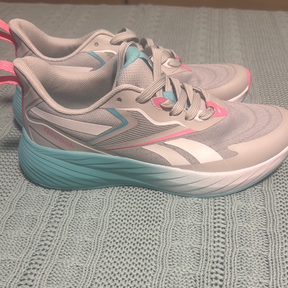 Reebok Gray and Pink Athletic Shoes with Sleek Silhouette